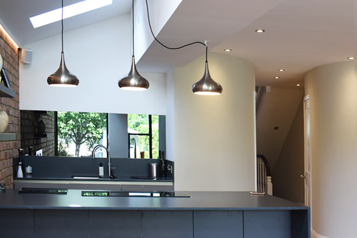 Contemporary kitchen extension with curved walls to link to the rest of the house.