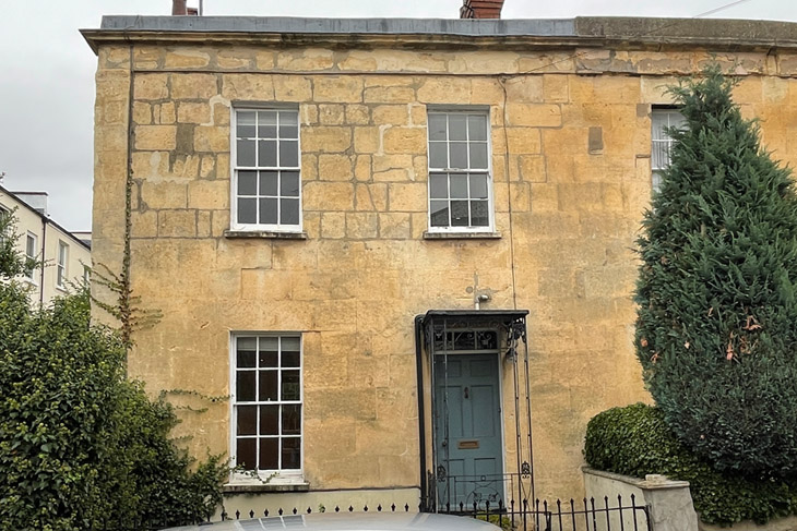 A Grade II Listed, ashlar stone facade; one of a pair of listed buildings of this period in Cheltenham's conservation area.